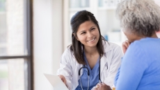 Healthcare professional consulting with a patient 