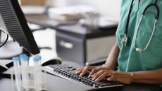 Nurse working at a computer