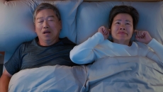 Man with sleep apnea in bed with his wife