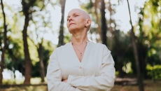 Oncology patient standing in nature