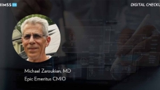 Dr. Michael Zaroukian, Epic Emeritus CMIO_Doctor using digital tablet with hologram Photo by Tippapatt/iStock/Getty Images Plus