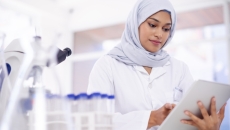 Person standing in a laboratory