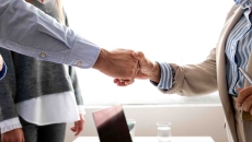 Two people shaking hands