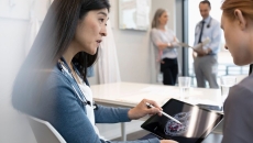 Doctors reviewing a brain scan