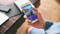 A close-up of a person using the Calm app on a smartphone.