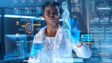 Doctor looking at a holographic image