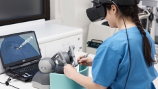 A person using the FundamentalVR platform for surgery training.