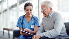 Provider gives options to patient while looking at a tablet or notepad