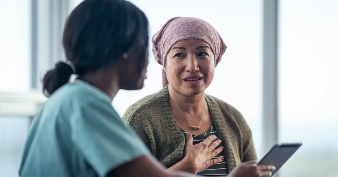Healthcare professional talking to a patient