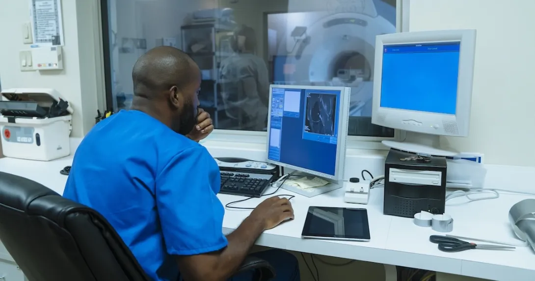 Healthcare professional looking at MRI data