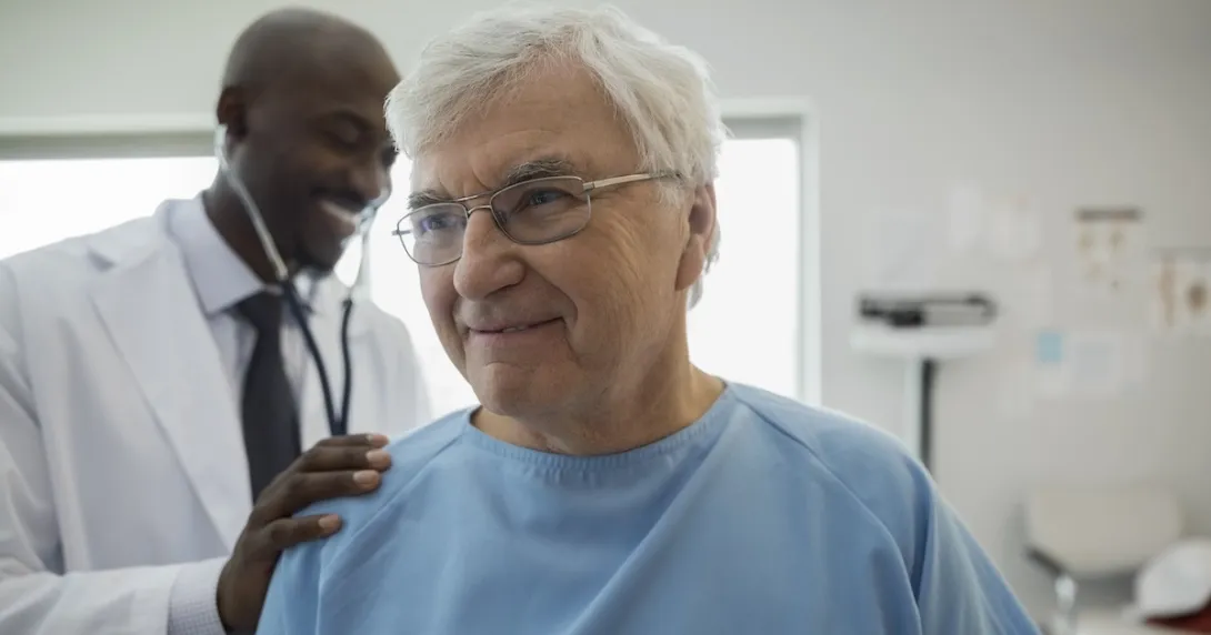 Healthcare professional examining a patient 