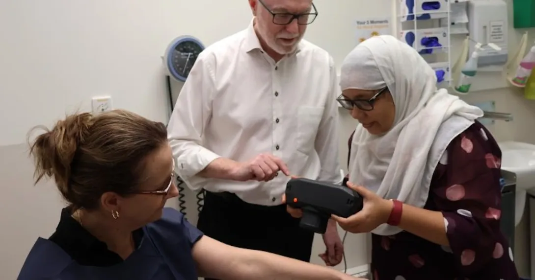 Dr Noor E Karishma Shaik demonstrating her AI-powered rapid skin cancer diagnostic device 