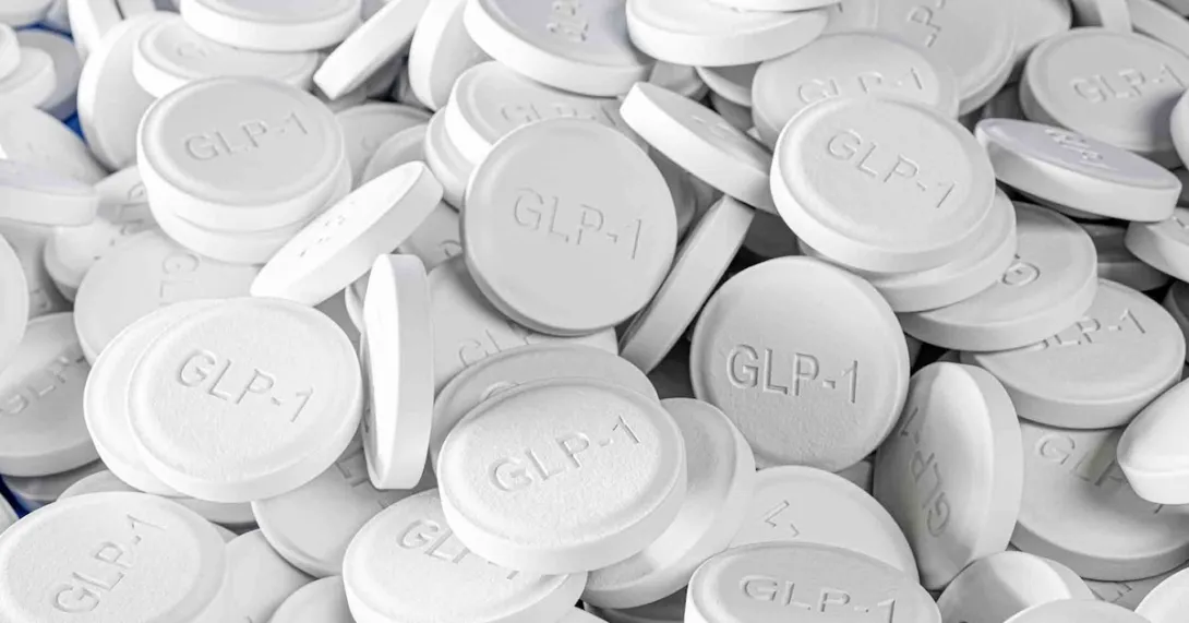 Pills that say GLP-1 on them