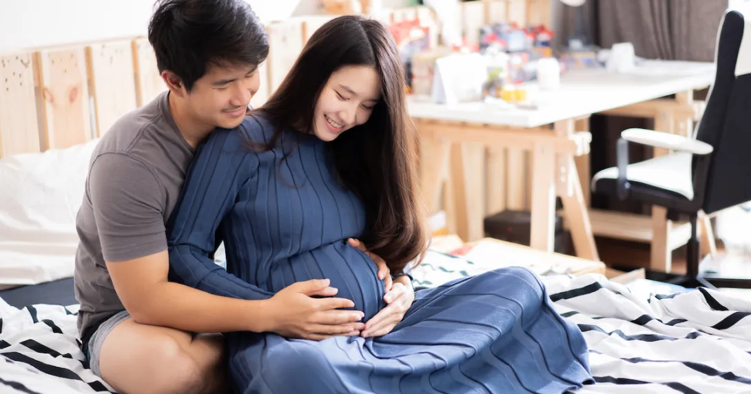 Two people sitting on the floor