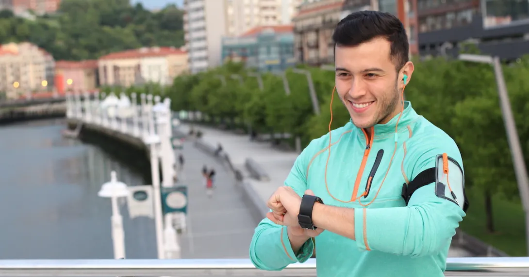 Person looking at their fitness watch