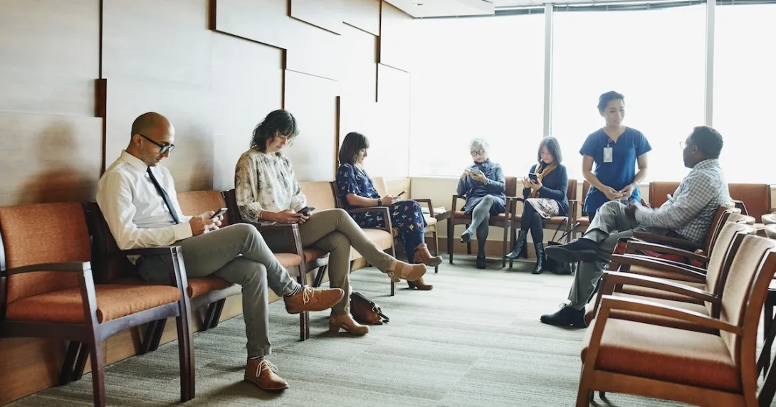 Patients sitting in a physician waiting room