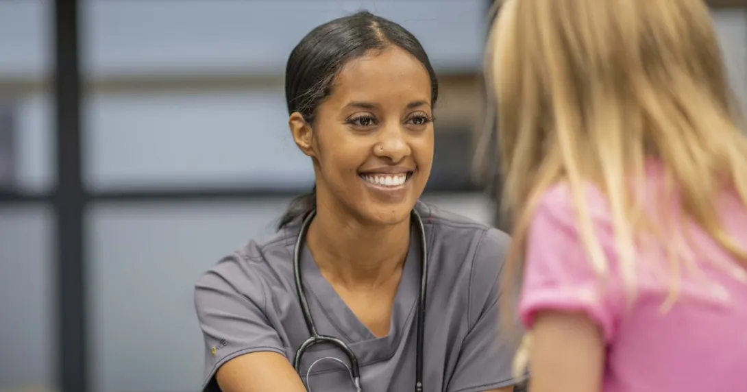 Person sitting with a school nurse