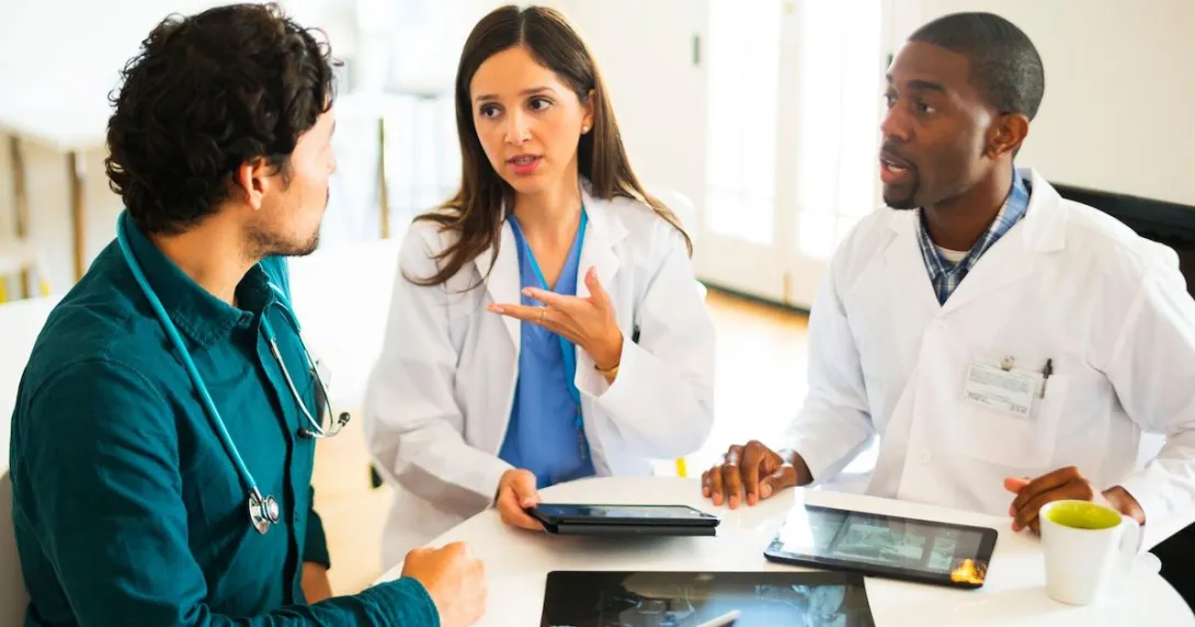 Doctors discussing imaging results.