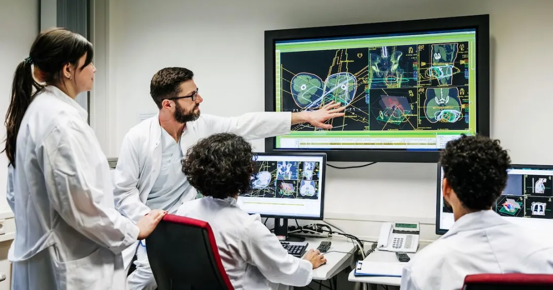 Healthcare providers looking at a diagnostic image